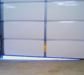 My Garage Has An Uneven Floor, Fixing Uneven Garage Door